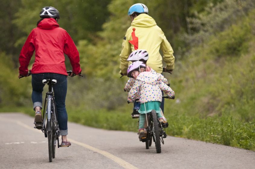 Family bike ride on northstar rail trail near cranbrook