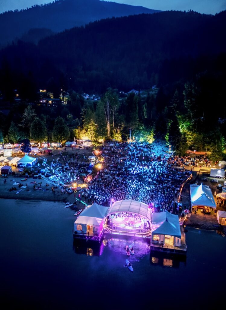 Kaslo Jazzfest 2024 featuring the floating stage in the evening