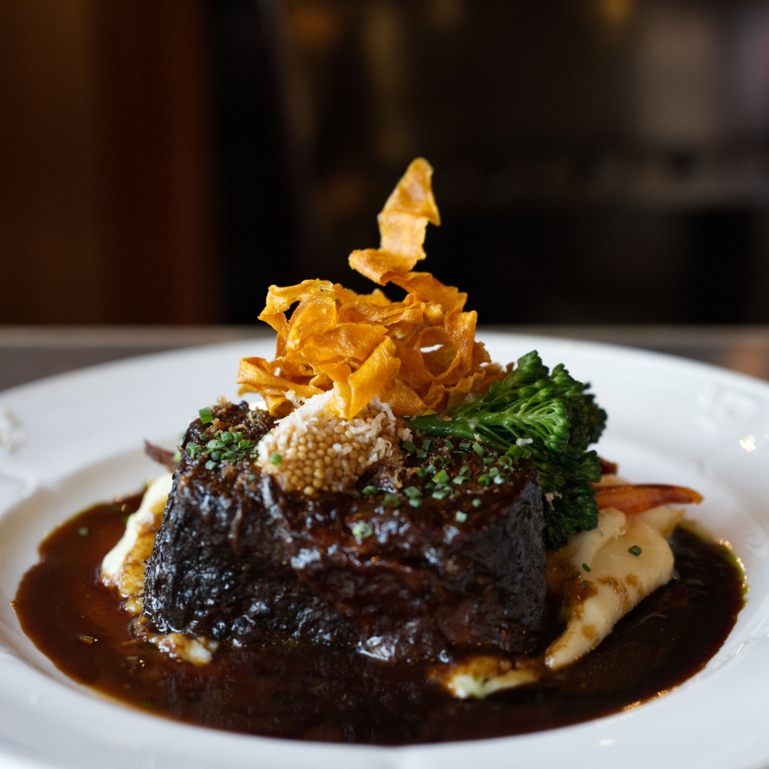 beef shoet rib on mashed potatoes ad gravy moat